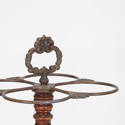 Lot 80 - A walnut and brass stick stand