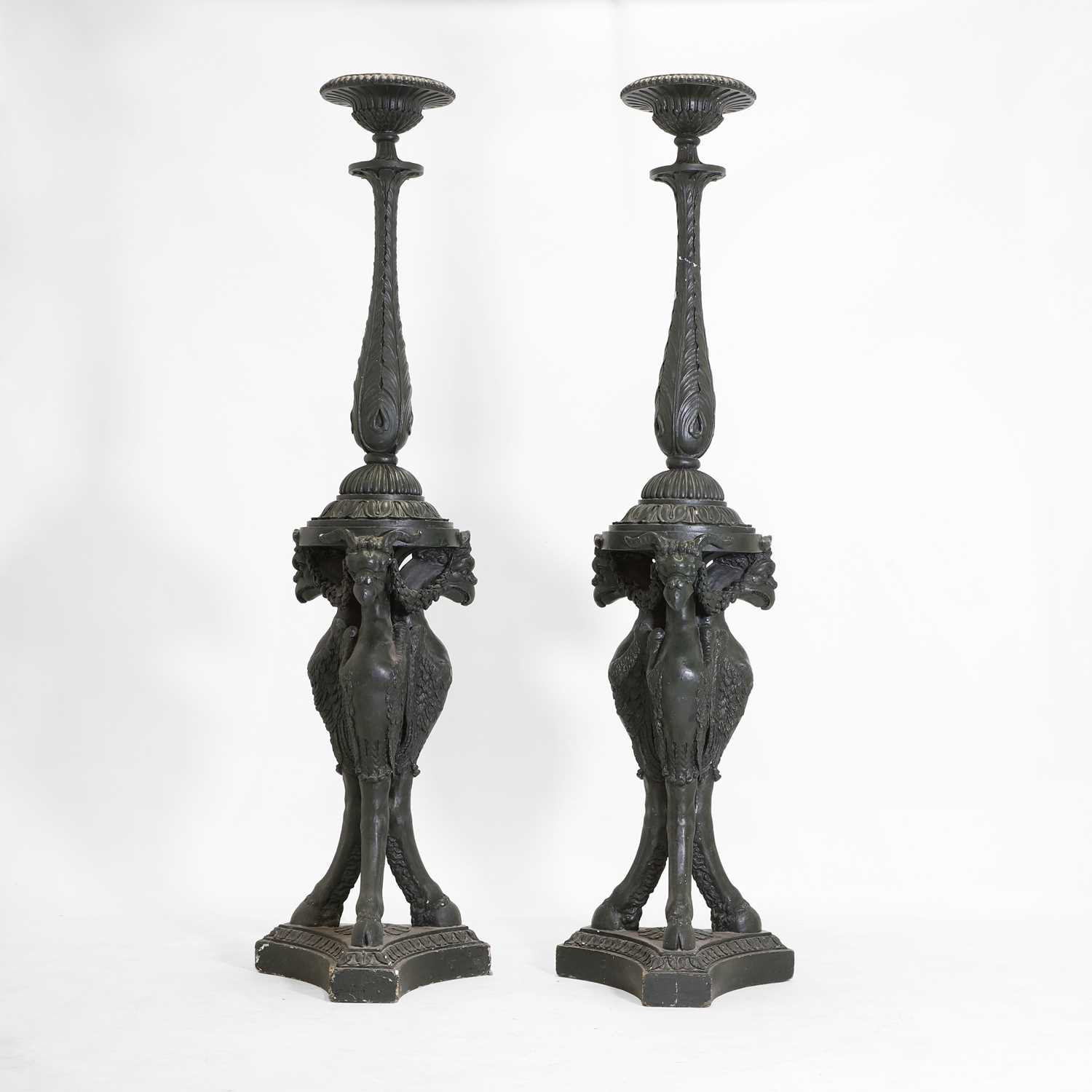 Lot 29 - A pair of painted plaster torchères