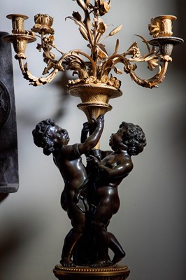 Lot 58 - A pair of large gilt-bronze, bronze, and porphyry candelabra after Jean-Louis Prieur
