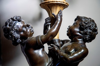 Lot 58 - A pair of large gilt-bronze, bronze, and porphyry candelabra after Jean-Louis Prieur