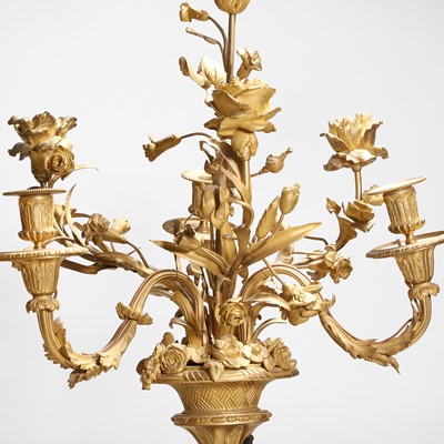 Lot 58 - A pair of large gilt-bronze, bronze, and porphyry candelabra after Jean-Louis Prieur
