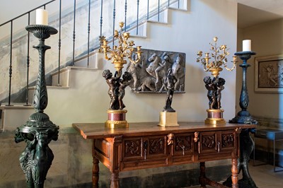 Lot 58 - A pair of large gilt-bronze, bronze, and porphyry candelabra after Jean-Louis Prieur