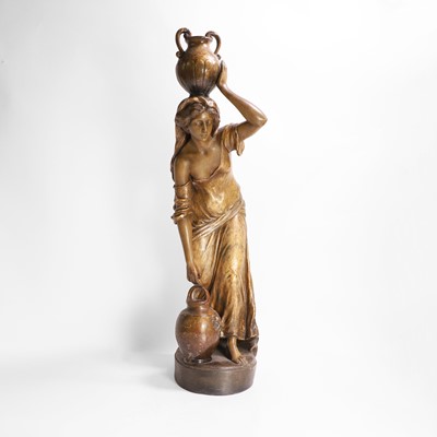 Lot 65 - A Goldscheider pottery figure of a female water carrier