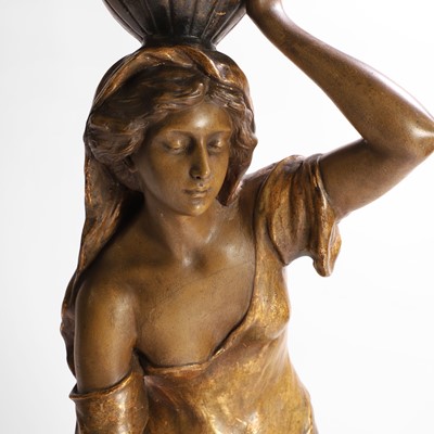 Lot 65 - A Goldscheider pottery figure of a female water carrier