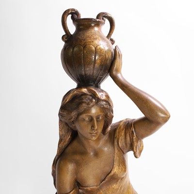 Lot 65 - A Goldscheider pottery figure of a female water carrier