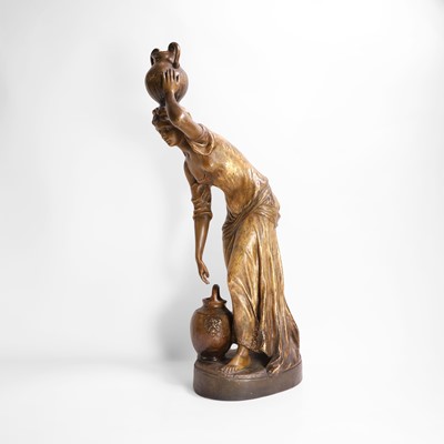 Lot 65 - A Goldscheider pottery figure of a female water carrier