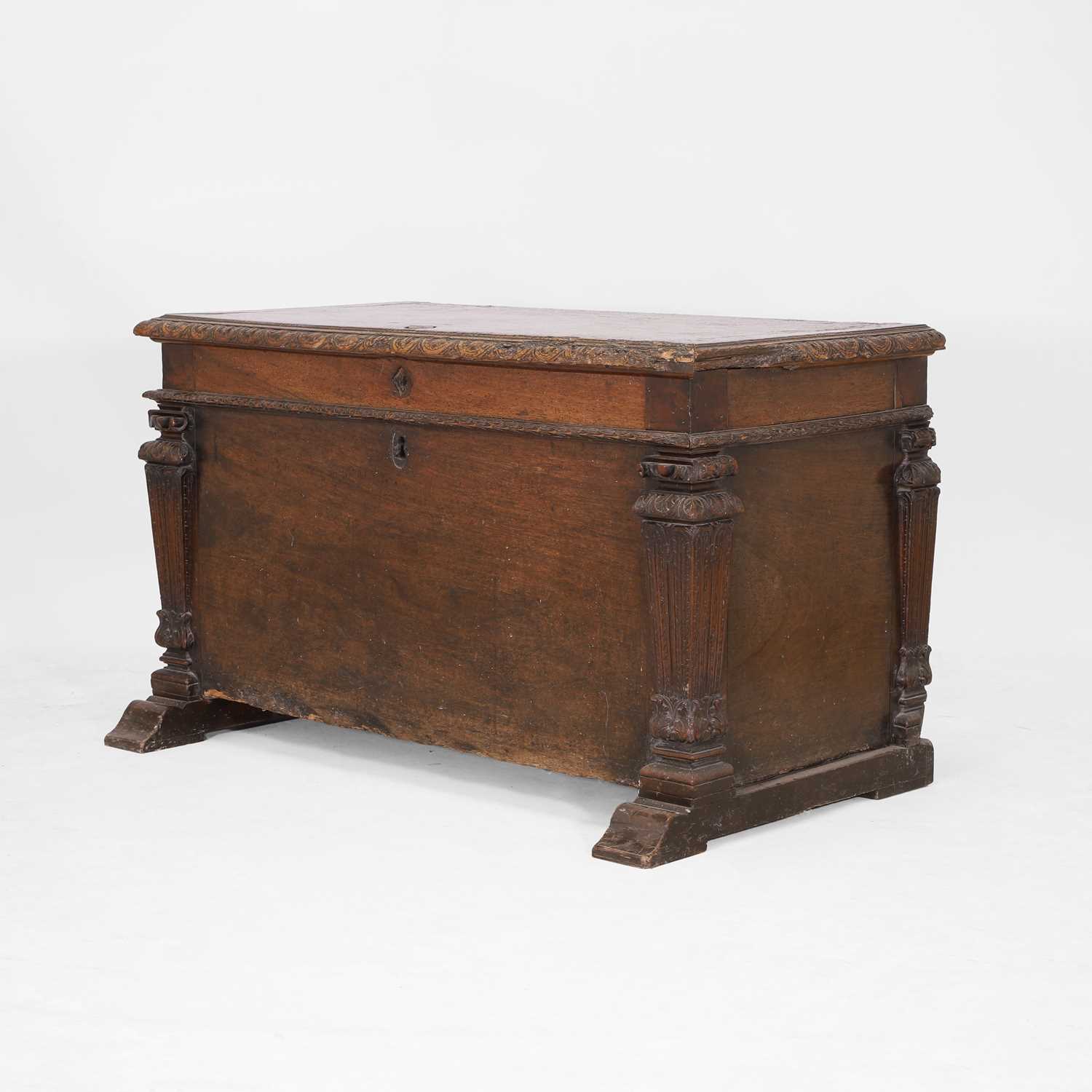 Lot 42 - A walnut cassone