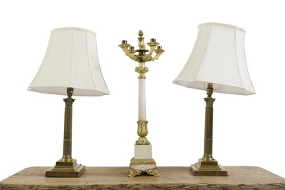 Lot 577 - A pair of brass table lamps