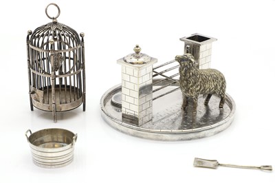 Lot 72 - A novelty silver plated cruet set
