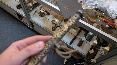 Lot 426 - Three gilt-iron pen cases
