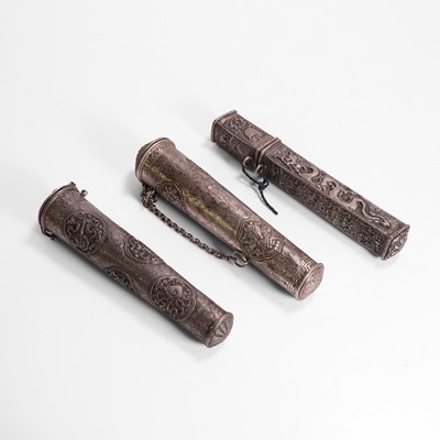 Lot 138 - Three silver scroll holders