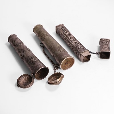 Lot 138 - Three silver scroll holders