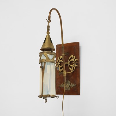 Lot 588 - An Art Nouveau brass and opaline glass wall light