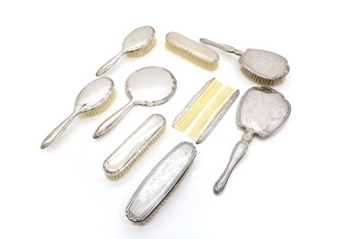 Lot 40 - Two cased silver dressing table sets