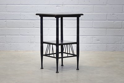 Lot 74 - An ebonised 'Thebes' side table