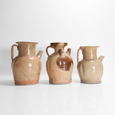 Lot 369 - Three Changsha stoneware ewers