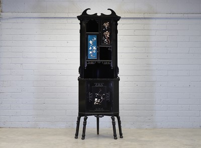 Lot 85 - An ebonised Anglo-Japanese corner cabinet