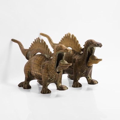 Lot 20 - A pair of large dinosaur brass nutcrackers