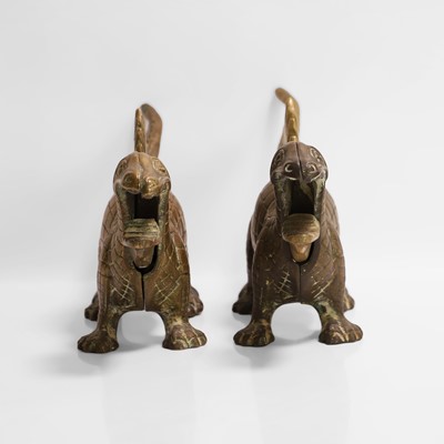 Lot 20 - A pair of large dinosaur brass nutcrackers