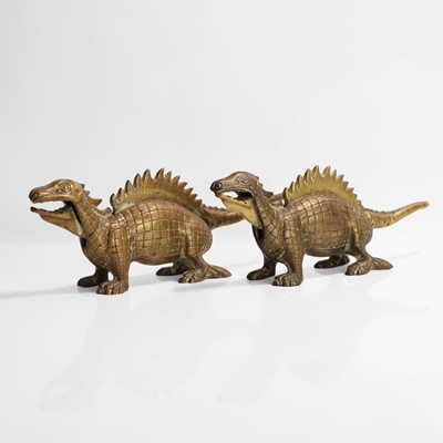 Lot 20 - A pair of large dinosaur brass nutcrackers