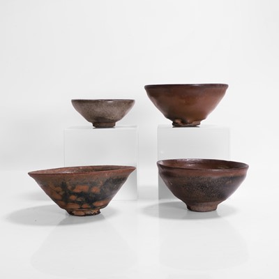 Lot 363 - A collection of four Jian ware tea bowls