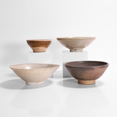 Lot 274 - A collection of four stoneware bowls