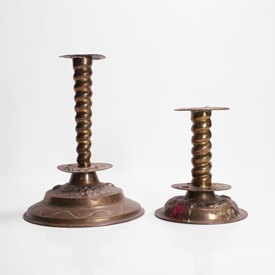 Lot 309 - Two brass candlesticks