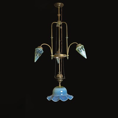 Lot 490 - A large Arts and Crafts brass four-light electrolier in the Manner of WAS Benson