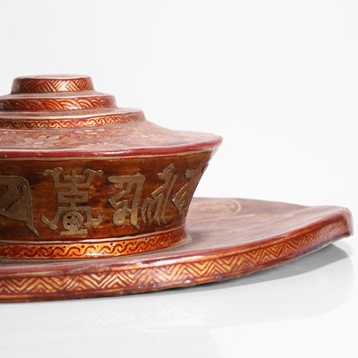 Lot 543 - A papier mâché ceremonial hat