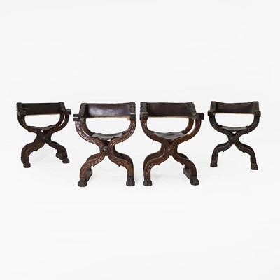 Lot 423 - A matched set of four walnut 'Dante' chairs