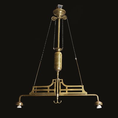 Lot 528 - A hanging brass twin-branch rise and fall ceiling light