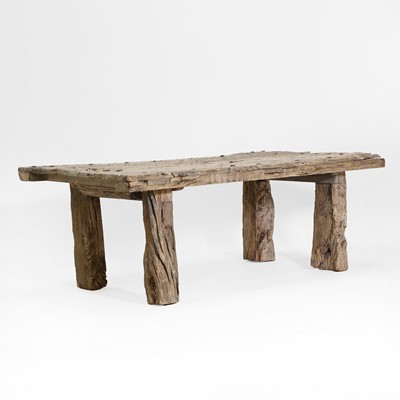 Lot 589 - An olivewood table