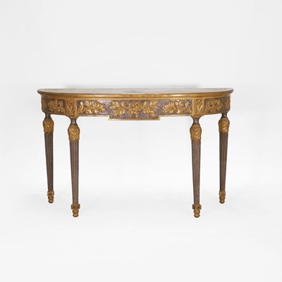 Lot 566 - A carved and painted giltwood console table