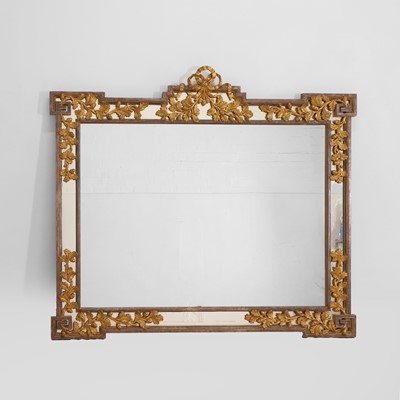 Lot 564 - A carved and burnished giltwood wall mirror