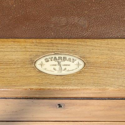 Lot 116 - A teak and brass-mounted pedestal desk by Starbay