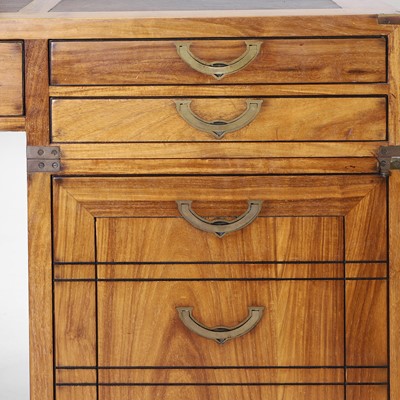 Lot 116 - A teak and brass-mounted pedestal desk by Starbay