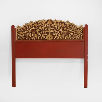 Lot 89 - A pair of carved, gilt and lacquered headboards