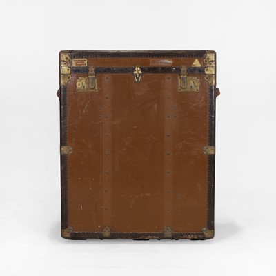 Lot 243 - A linoleum and metal-mounted upright trunk