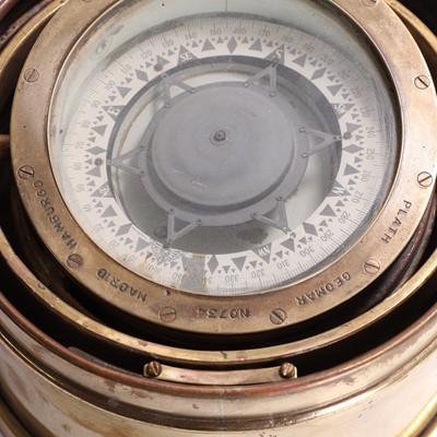 Lot 202 - A gimballed brass ship's compass