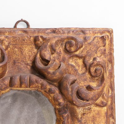 Lot 10 - A baroque carved and giltwood wall mirror