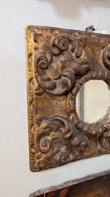 Lot 10 - A baroque carved and giltwood wall mirror