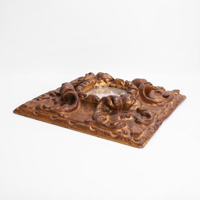 Lot 10 - A baroque carved and giltwood wall mirror