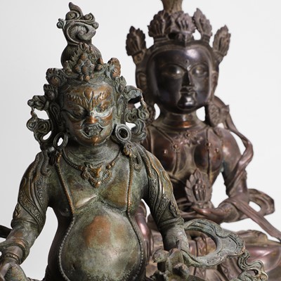 Lot 248 - A hollow-cast bronze figure of Jambhala