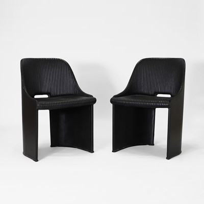 Lot 66 - A pair of art deco-style leather tub chairs