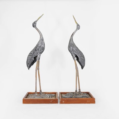 Lot 509 - A pair of large painted garden ornaments in the form of cranes