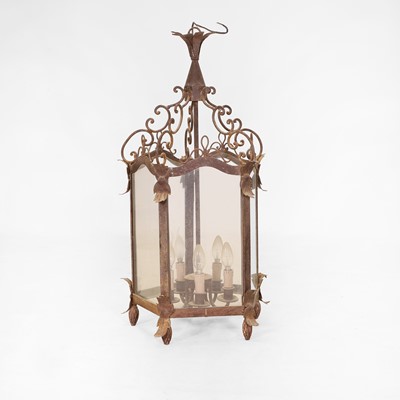 Lot 585 - A hexagonal wrought-iron hanging lantern