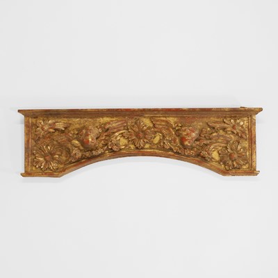 Lot 300 - A carved giltwood arched panel