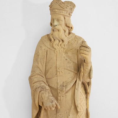 Lot 133 - A large carved sandstone figure of a bishop