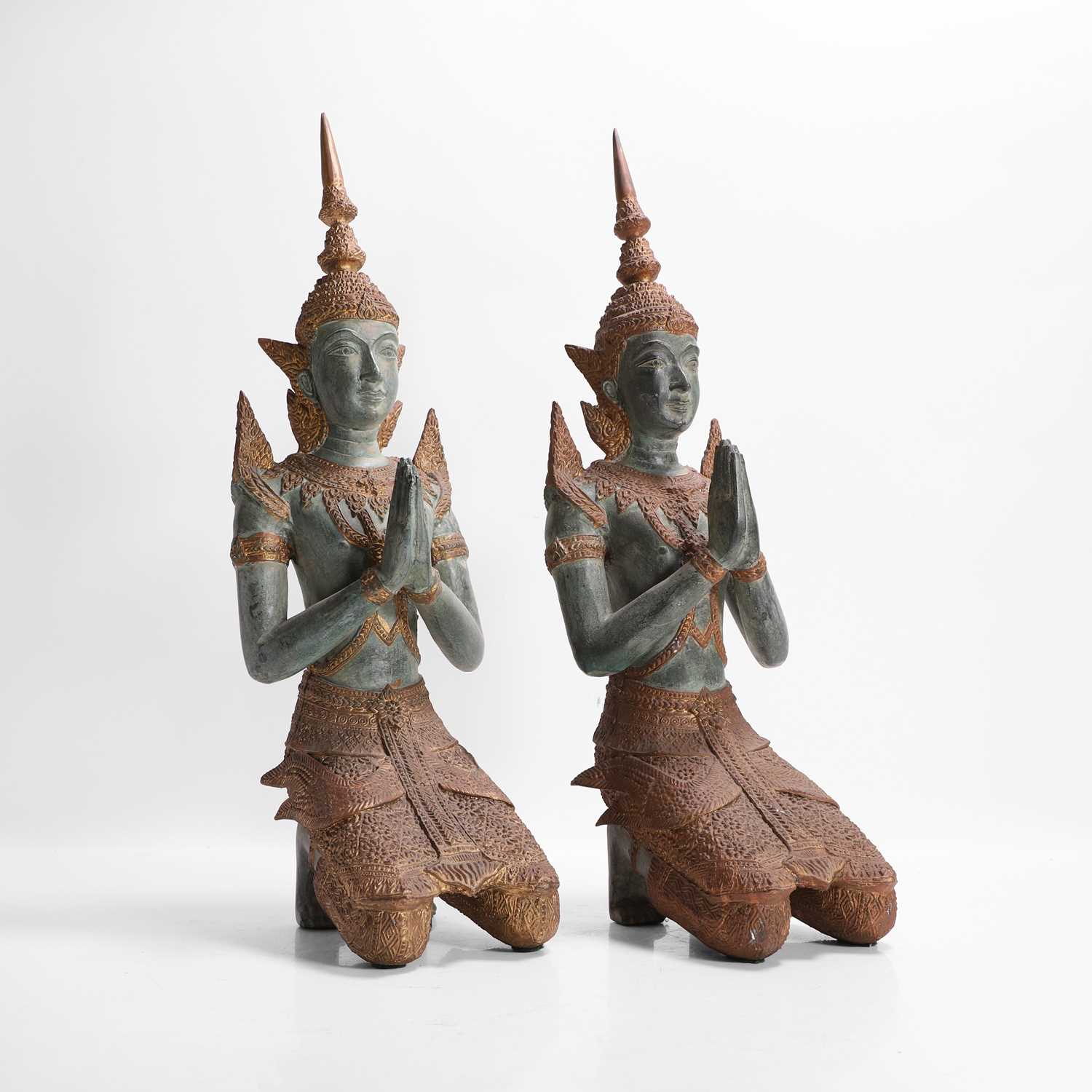 Lot 14 - A pair of patinated bronze 'Teppanom' angel kneeling figures