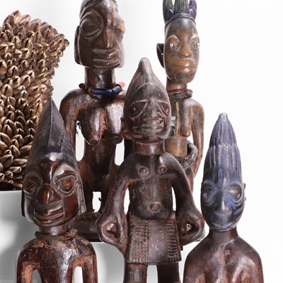 Lot 175 - A collection of ten African carved wood figures